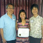 Elizabeth Uno (center) with her parents, Richard and Irene