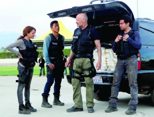 A scene from "Gang Related" with (from left) Inbar Lavi, Sung Kang and Terry Quinn.  