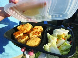 Stinky tofu bento box served with pickled cabbage prepared at the market. Photo by Tiffany Ujiiye