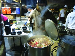 Large pots of stinky tofu fill the night market air with stench and spice. Photo by Tiffany Ujiiye