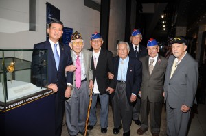 Veterans shown left to right: George Fujimoto (442), Nelson Akagi (442), Susumu Ito (442), Lawson Sakai (442), Tommie Okabayashi (442), Robert Pieser (36th Division).