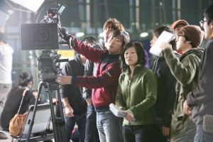 Director Christine Yoo (center) filmed "Wedding Palace" in South Korea and Los Angeles. 